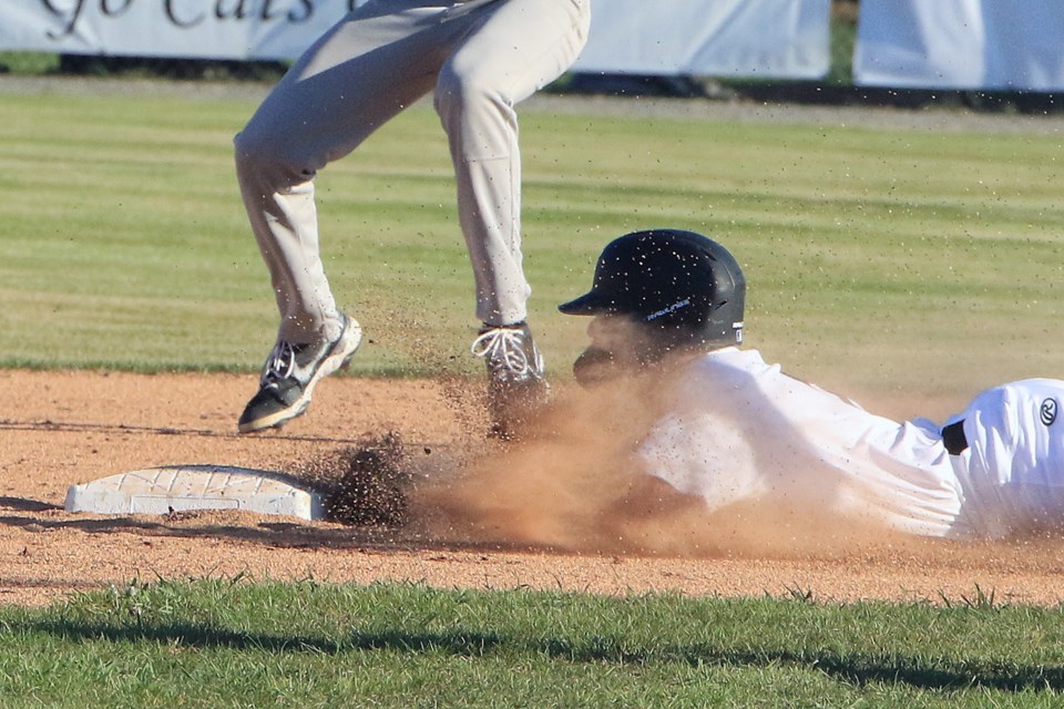 Thunder Bay's Kael Babin slides safely into second on Wednesday, May 28, 2025 during the Border Cats home opener against the Rochester Honkers at Port Arthur Stadium. (Leith Dunick, tbnewswatch.com)