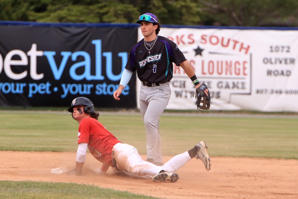 Thunder Bay's Manny Alberto slides in safely to second as Rochester shortstop Allan Camarillo looks on, on Thursday, May 29. 2025. (Leith Dunick, tbnewswatch.com)