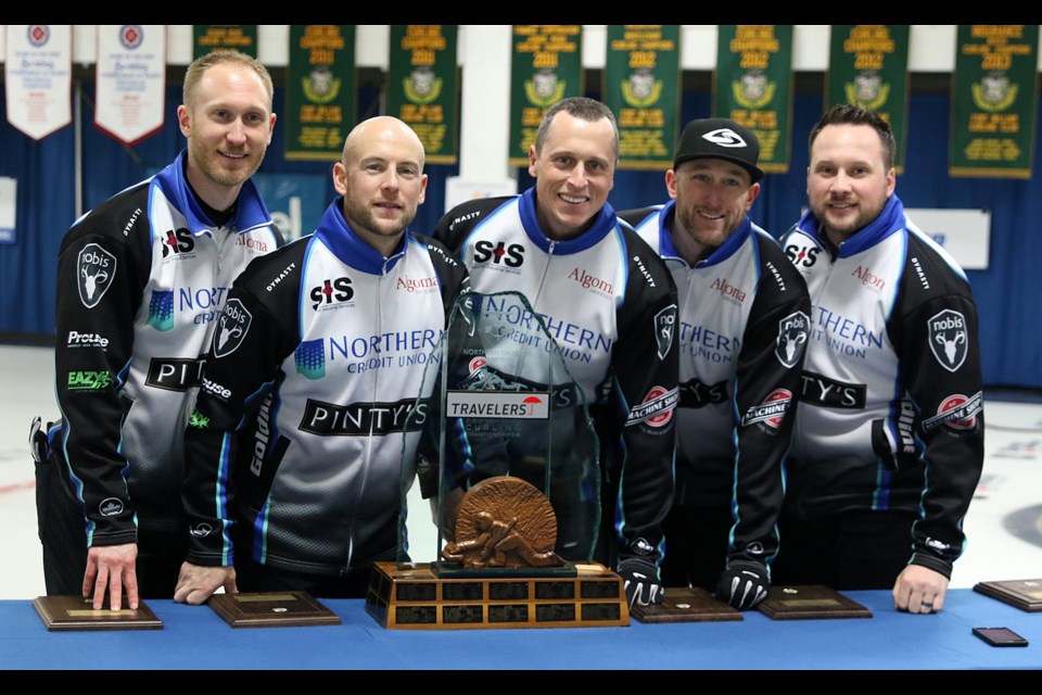 Brad Jacobs (from left), Ryan Fry, E.J. Harnden, Ryan Harnden and coach Caleb Flaxey celebrate their win on Sunday, Feb. 12, 2017 at the 2017 Travelers Provincial Men's Championship (Leith Dunick, tbnewswatch.com). 
