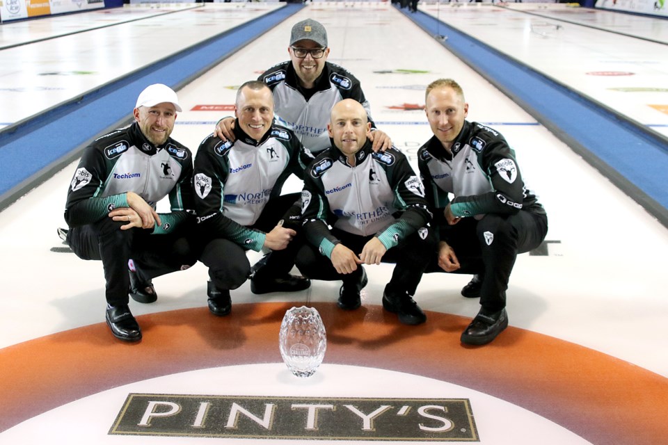 Ryan Harnden, E.J. Harnden, Ryan Fry and Brad Jacobs celebrate their Pinty's Grand Slam of Curling Tour Challenge championship on Sunday, Nov. 11, 2018 at the Thunder Bay Tournament Centre. (Leith Dunick, tbnewswatch.com)