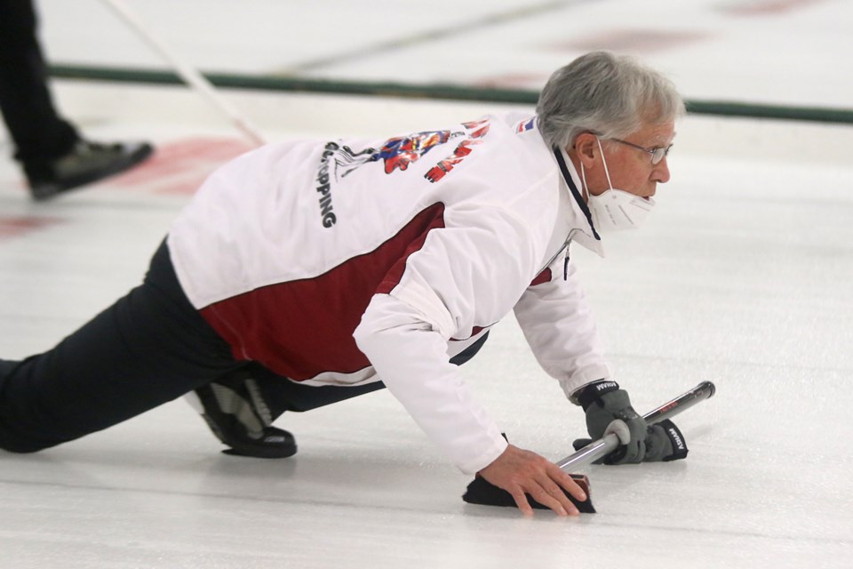 Skip Al Hackner startes down a shot in Tbaytel Major League of Curling play on Wednesday, Dec. 9, 2020 at the Port Arthur Curling Club. (Leith Dunick, tbnewswatch.com)