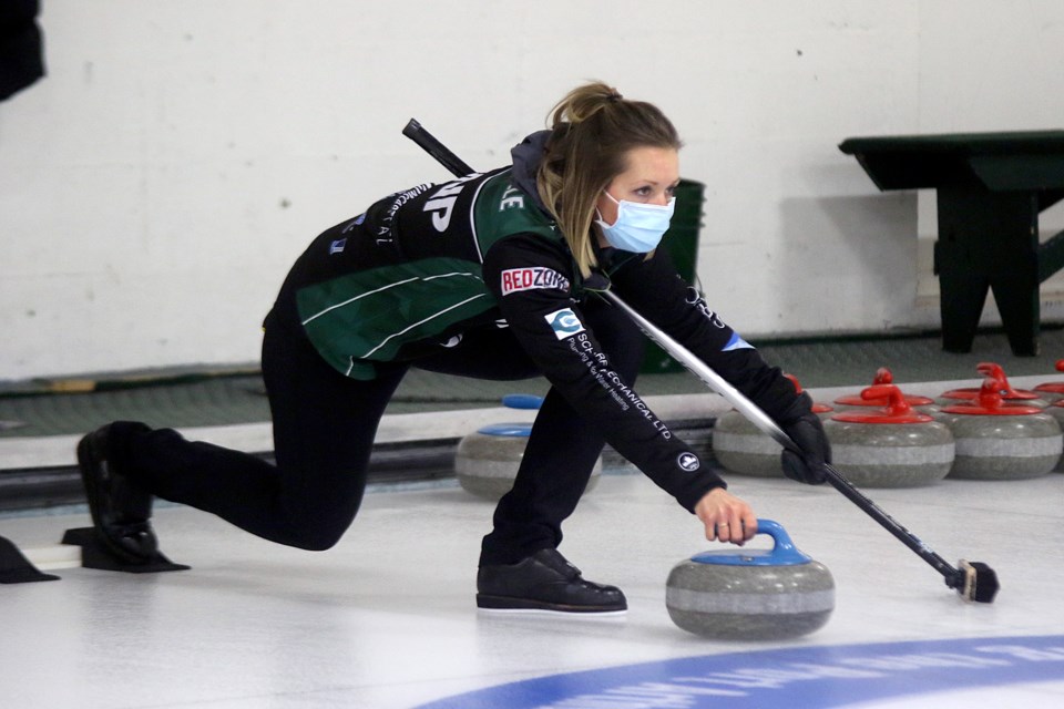Krista McCarville throws skip stones in the third end on Wednesday, Nov. 25, 2020 during Draw 9 of the Tbaytel Major League of Curling season at Port Arthur Curling Club. (Leith Dunick, tbnewswatch.com)
