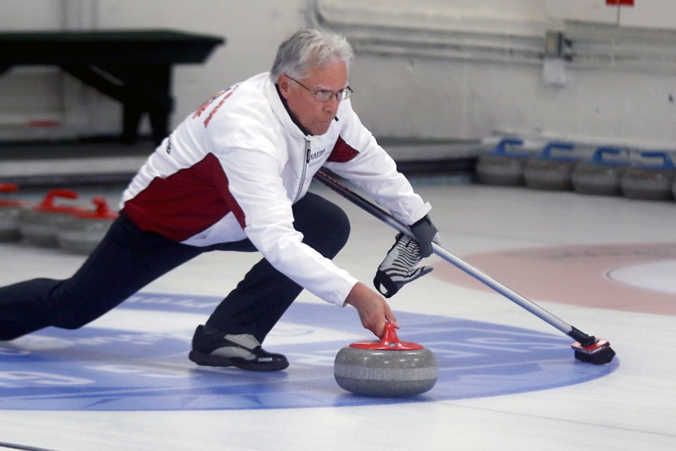 Veteran Al Hackner takes a shot on Wednesday, Oct. 28, 2020 in Tbaytel Major League of Curling play. (Leith Dunick, tbnewswatch.com)