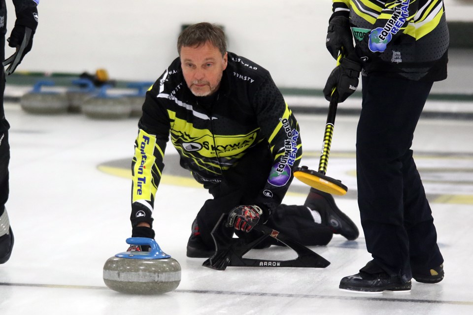 Kent Maarup releases a shot on Wednesday, Nov. 10, 2021 at the Port Arthur Curling Club during Tbaytel Major League of Curling play. (Leith Dunick, tbnewswatch.com)