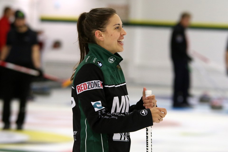 Sarah Potts enjoys a moment between shots on Wednesday, Oct. 13, 2021 at the Port Arthur Curling Club. (Leith Dunick, tbnewswatch.com)