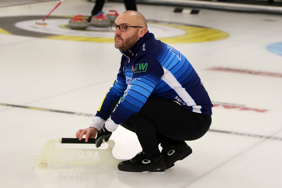 Trevor Bonot watches his shot on Wednesday, Dec. 7, 2022 during Week 9 Tbaytel Major League of Curling play at the Port Arthur Curling Club. (Leith Dunick, tbnewswatch.com)