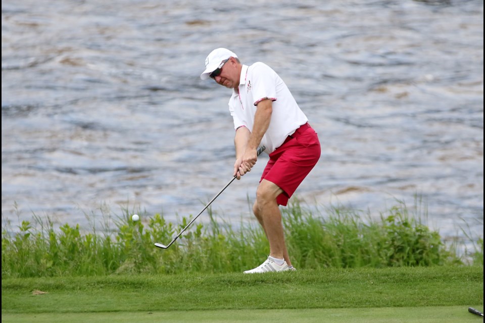 Barry Caland chips out of the rough on No. 4 at Whitewater Golf Club on Sunday, July 2, 2017 during the Keg District Open (Leith Dunick, tbnewswatch.com). 