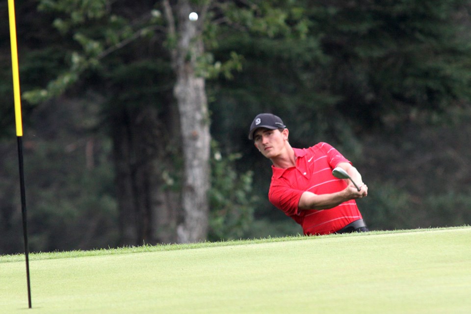 Brett Shewchuk watches a shot during the championship final of the Strathcona Invitational on Monday. (Matt Vis, tbnewswatch.com)