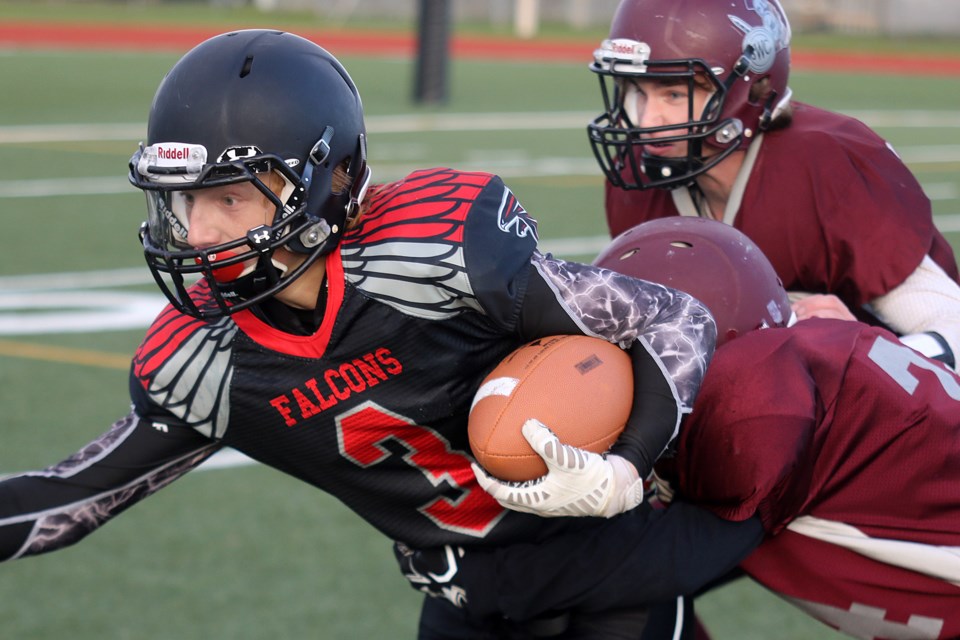 St. Ignatius receiver Jacob Anton hauls in a catch against the Churchill Trojans on Thursday, Nov. 3, 2016 at Fort William Stadium (Leith Dunick, tbnewswathc.com). 