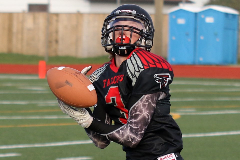 St. Ignatius receiver Jakob Anton hauls in a 56-yard scoring pass from quarterback Jordan Maki on Thursday, Oct. 13, 2016 against the Hammarskjold Vikings at Fort William Stadium (Leith Dunick, tbnewswatch.com). 