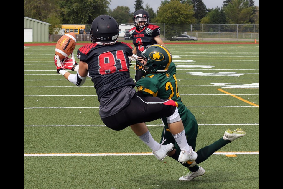St. Ignatius receiver Josh Newransky (81) was unable to haul in this touchdown catch, the play broke up by St. Patrick's Daylor McWatch (24) on Saturday, Sept. 17, 2016 at Fort William Stadium (Leith Dunick, tbnewswatch.com)