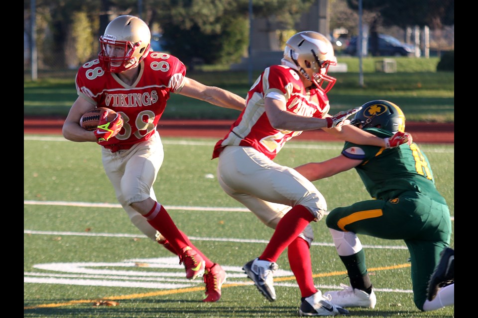 Hammarskjold's Zach Hynna looks for open space with the ball against the St. Patrick Saints on Friday, Nov. 4, 2016 at Fort William Stadium (Leith Dunick, tbnewswatch.com). 