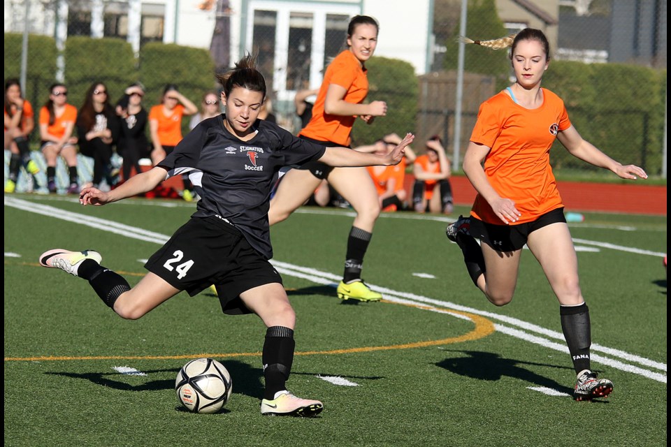 Falcons forward Olivia Walsh fires off a shot in the high school girls soccer final on Thursday, May 25, 2017 at Fort William Gardens (Leith Dunick, tbnewswatch.com). 