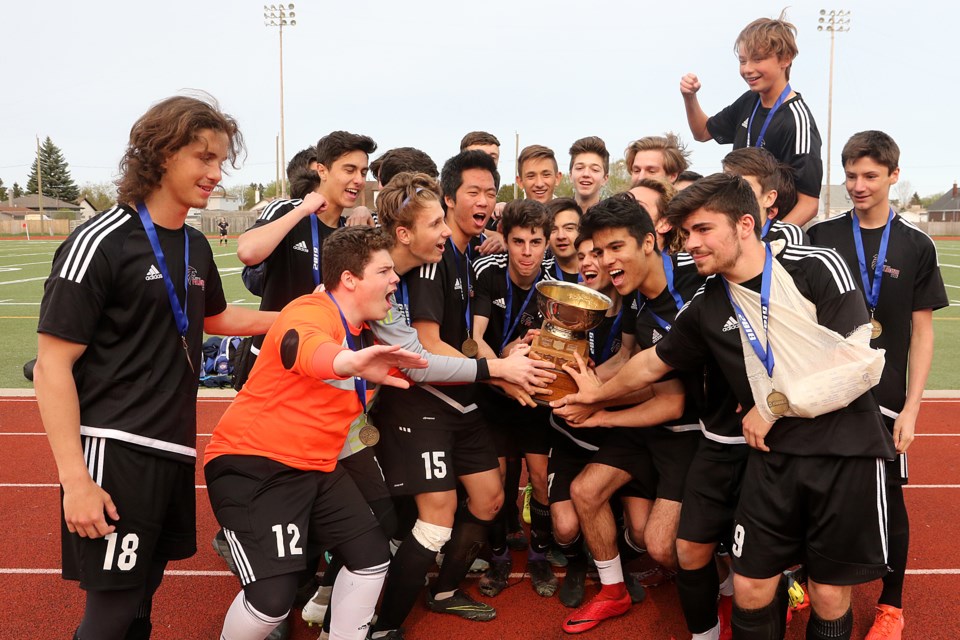 The St. Ignatius Falcons celebrate a second straight high school boys soccer championship on Thursday, May 30, 2019 at Fort William Stadium. (Leith Dunick, tbnewswatch.com)