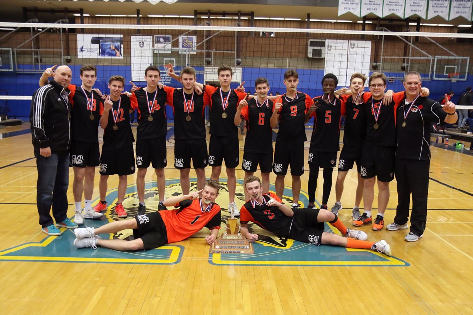 The 2019 Westgate Tigers senior boys' volleyball team captured its second straight championship on Monday, Nov. 11, 2019 at the C.J. Sanders Fieldhouse. (Leith Dunick, tbnewswatch.com)