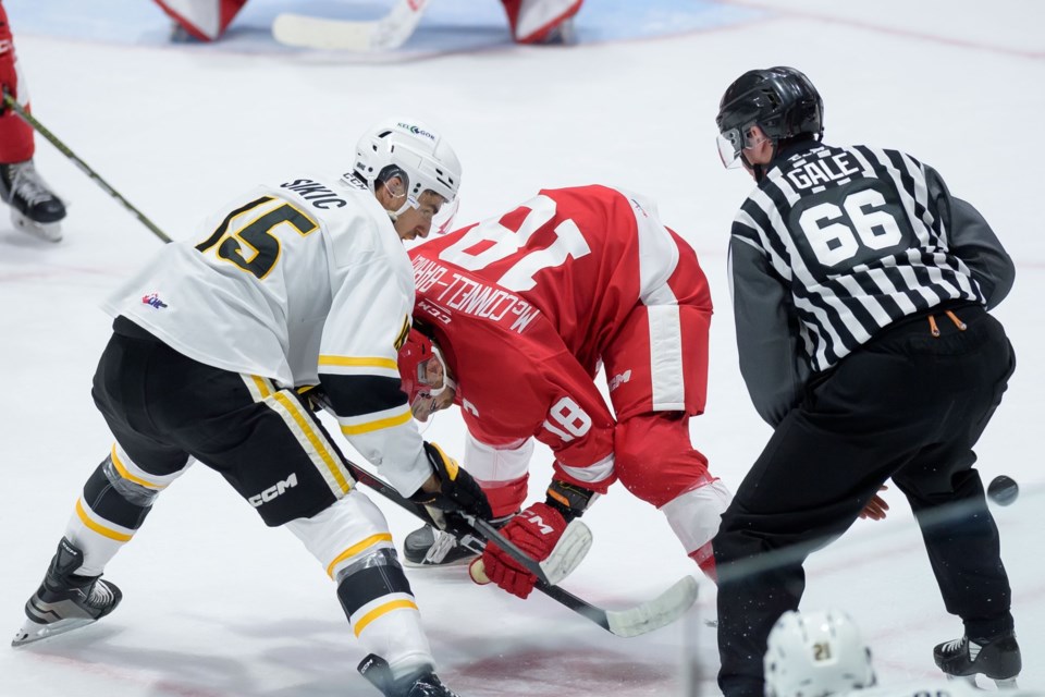 Devon Gale during a faceoff on Friday, October 6, 2023