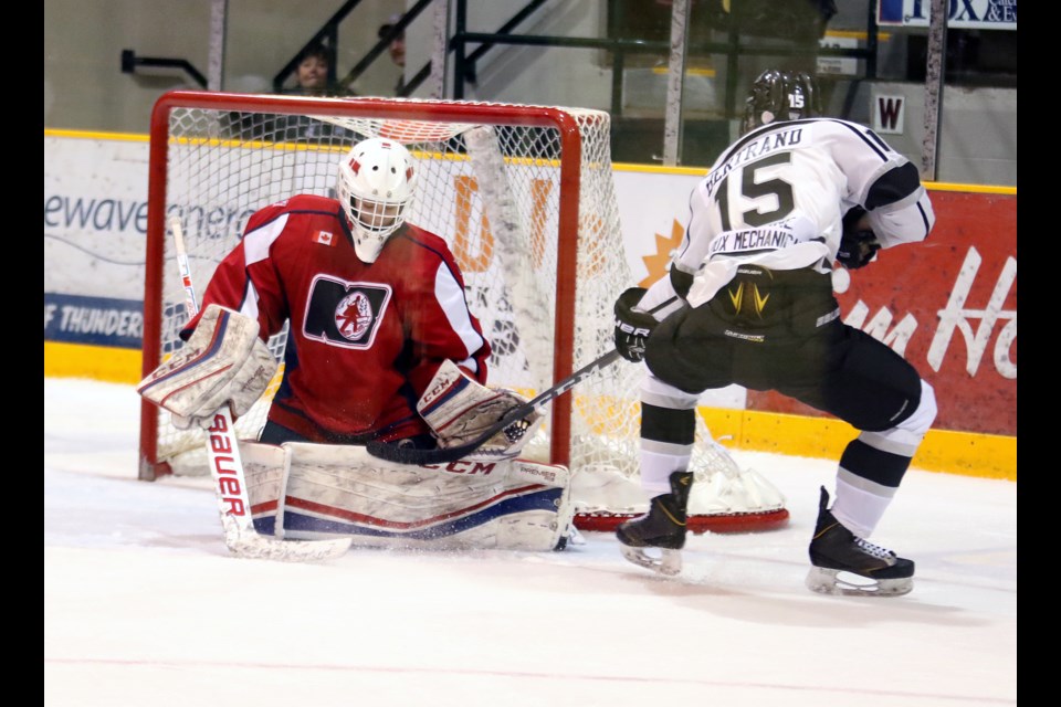 Thunder Bay's Dylan Bertrand takes a shot against North Bay Trappers goalie Reece Proulx. Proulx made 22 saves to lead the Trappers to a 4-0 win on Monday, March 27, 2017 at the All Ontario Bantam AAA Championship at Fort William Gardens (Leith Dunick, tbnewswatch.com). 