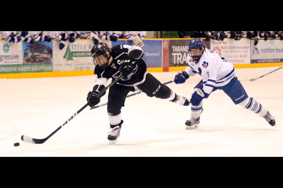 Thunder Bay's Michael Stubbs charges in on goal on a shorthanded breakaway on Wednesday, March 29, 2017, with Toronto's Lleyton Moore in pursuit (Leith Dunick, tbnewswath.com). 