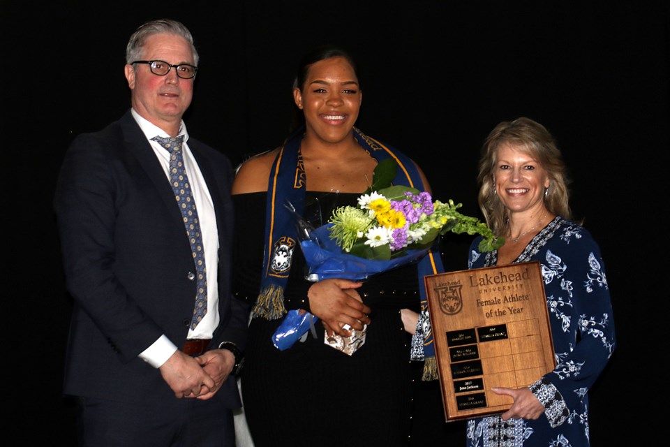 Leashja Grant (centre) accepts Lakehead's female athlete of the year award on Saturday, April 6, 2019. (Leith Dunick, tbnewswatch.com)