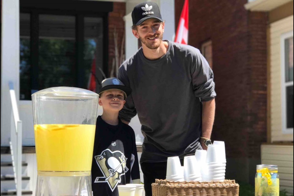 Gavin Currie, 7, and Matt Murray on Sunday, July 16, 2017 (Travis Ulrich). 