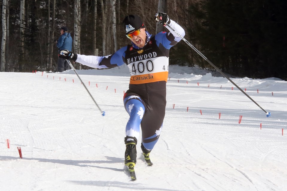 Thunder Bay's Michael Somppi lunges at the line to take second place in the senior men's 15-kilometre pursuit race at Lappe Nordic Ski Centre on Tuesday, March 13, 2018. (Leith Dunick, tbnewswatch.com)