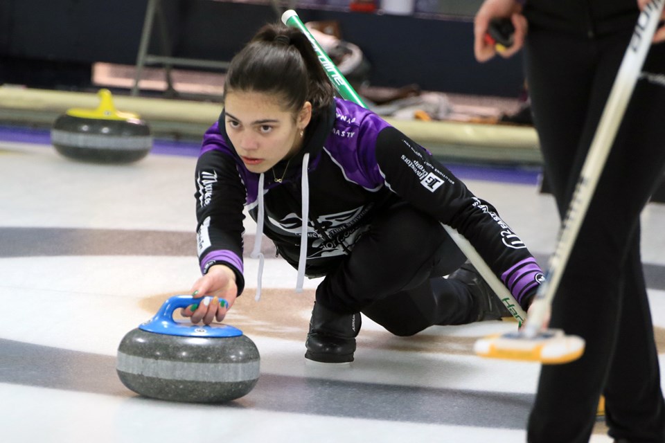 Skip Claire Dubinsky takes a shot on Saturday, Feb. 24, 2024 at the Ontario Winter Games at the Fort William Curling Club. (Leith Dunick, tbnewswatch.com)