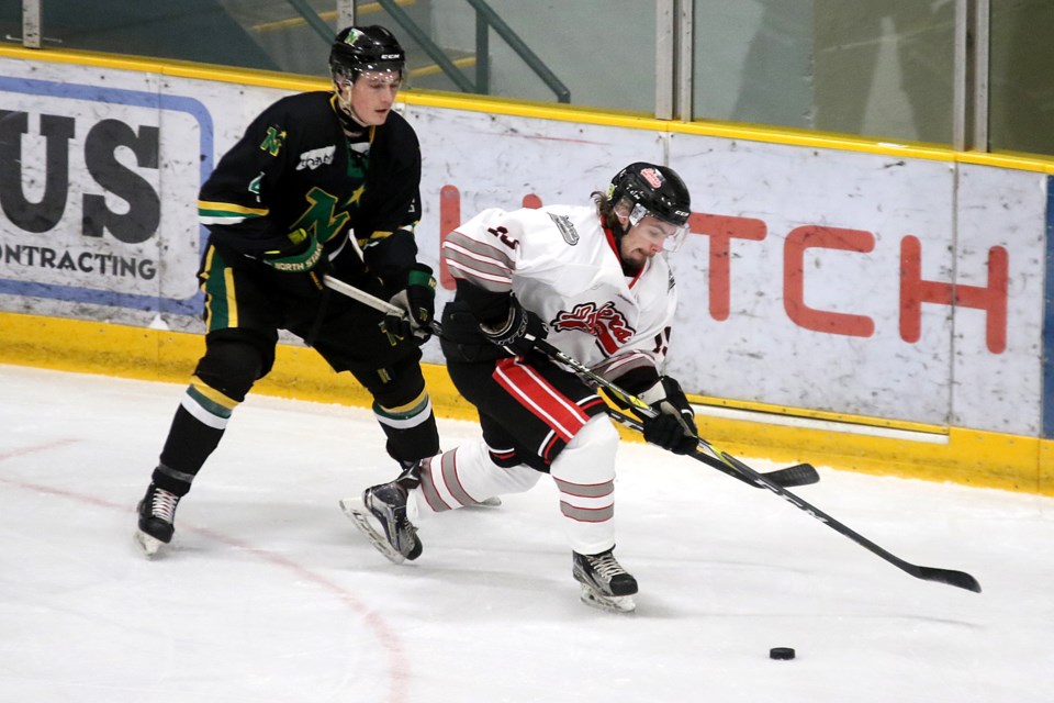 Fort Frances forward Noah Loveday skates away from Thunder Bay defenceman Matthew Halushak on Tuesday, Feb. 19, 2019 at Fort William Gardens. (Leith Dunick, tbnewswatch.com)
