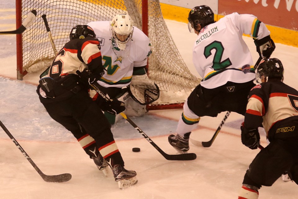 Fort Frances's Noah Loveday moves in on Thunder Bay goalie Brock Aiken and blue-liner Robert McCollum on Friday, Oct. 19., 2018 at Fort William Gardens. (eith Dunick, tbnewswatch.com)