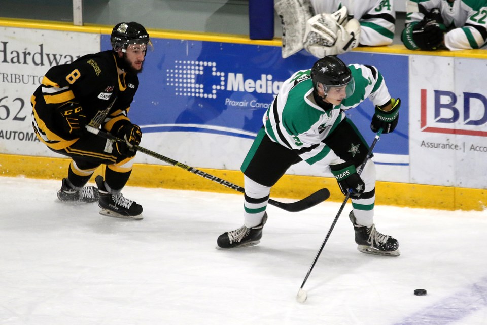 Red Lake's Noah Kwasny chases down Thunder Bay's Joel Willan on Saturday, Oct. 12, 2019. (Leith Dunick, tbnewswatch.com)