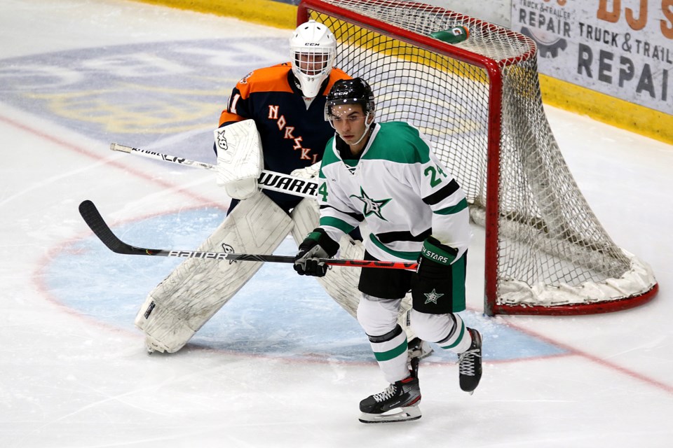 Cody Bruchkowski awaits the puck in front of Thief River Falls goaltender Seth Purcilly on Friday, Oct. 4, 2019 at Fort William Gardens. (Leith Dunick, tbnewswatch.com)
