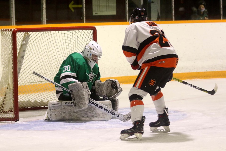 Thunder Bay's Seth McKay makes a stop on Saturday, Nov. 28, 2020 against Kam River's Ethan Lang. 