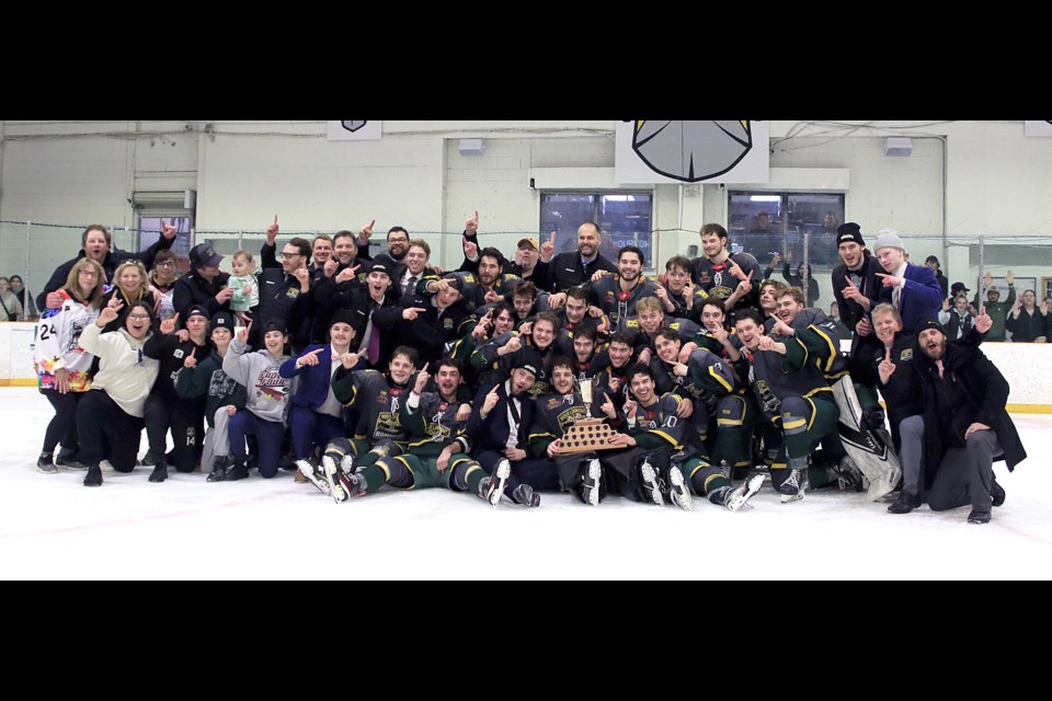 The Sioux Lookout Bombers celebrate after winning the Bill Salonen Cup on April 21. 