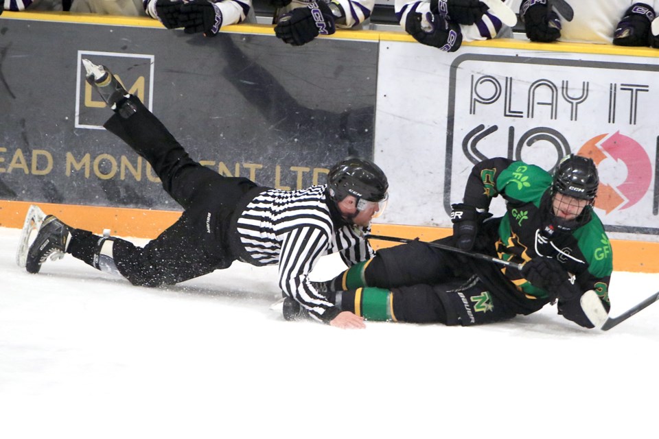 Thunder Bay North Stars captain Tyler Jordan, who scored twice on the night, gets tangled up with a linesman on Friday, March 28, 2025, in the Stars 7-5, Game 5 win over the visiting Fort Frances Lakers, (Leith Dunick, tbnewswatch.com)
