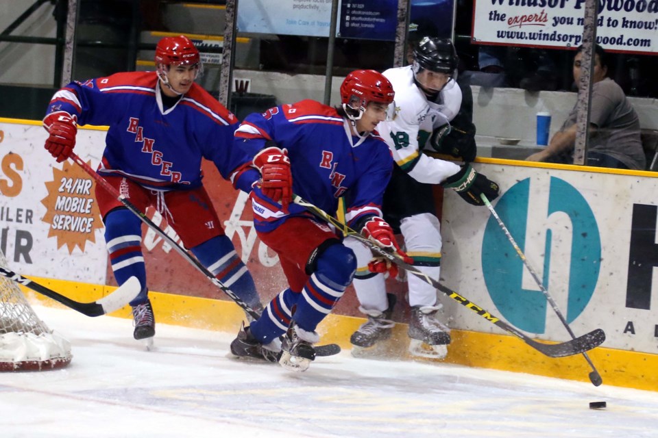 Minnesota's Bryce Litke (16) and Anthony Beltrame (6) chase down Thunder Bay's Shane McKay on Friday, Dec. 1, 2017 at Fort William Gardens. (Leith Dunick, tbnewswatch.com)