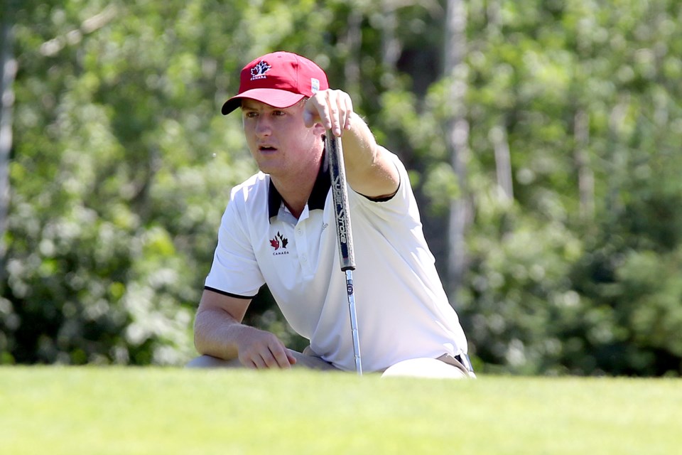 Jared du Toit surveys a putt on No. 9 at Whitewater Golf Club on Friday, July 14, 2017 (Leith Dunick, tbnewswatch.com).