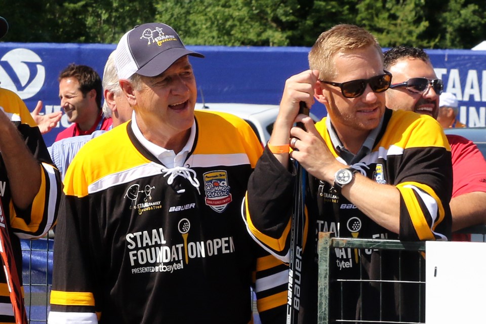 Bobby Orr and Trevor Letowski watch the action during the Fountain Tire Summer Classic on Monday, July 10, 2017. Both will return in 2018. (Leith Dunick, tbnewswatch.com)
