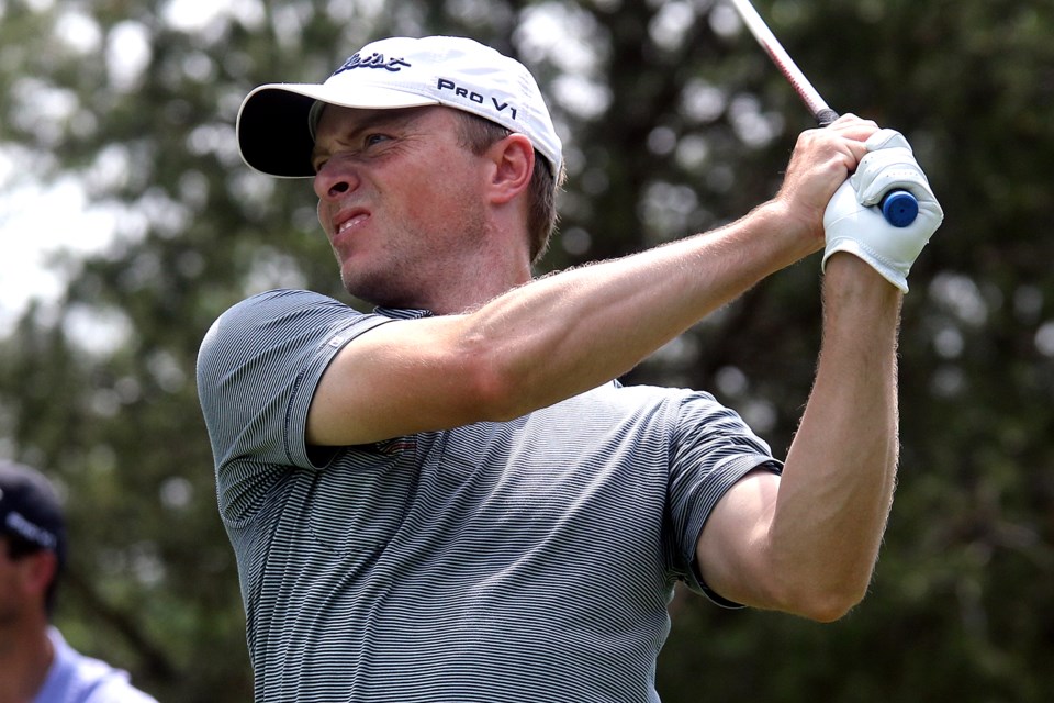 American David Bradshaw holds the 18-hole lead at the Staal Foundation Open, firing a 10-under 62 to tie a course record on Thursday, July 12, 2018 at Whitewater Golf Club. (Leith Dunick, tbnewswatch.com)