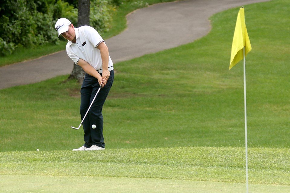 Evan DeGrazia chips on the sixth hole at Whitewater Golf Club on Friday, July 13, 2018 during the Staal Foundation Open. (Leith Dunick, tbnewswatch.com)