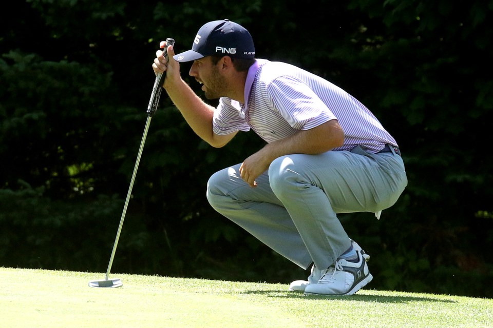 Blake Olson lines up a putt on 12 during Round 3 of the Staal Foundation Open on Saturday, July 1, 2018 at Whitewater Golf Club. (Leith Dunick, tbnewswatch.com)