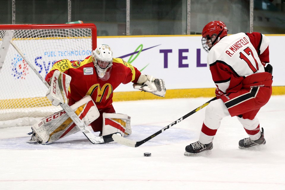 Toronto's Ryan Mansfield is stopped on a first-period breakaway by Halifax Macs goalie Liam Oxner at the Telus Cup on Monday, April 22, 2019 at Fort William Gardens. (Leith Dunick, tbnewswatch.com)