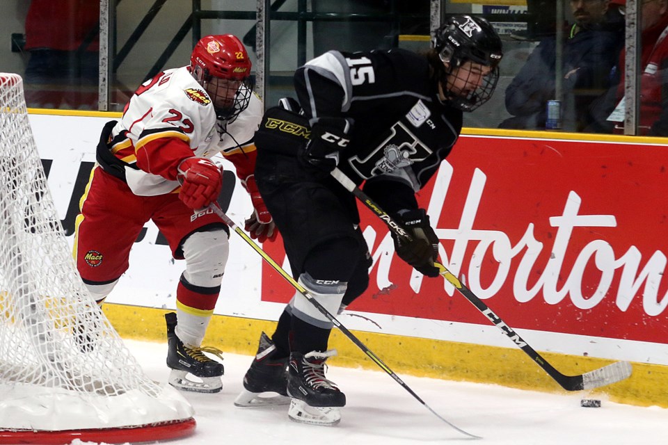 Halifax's Matthew MacDonald (left) chases down Thunder Bay defenceman Trystan Goodman on Thursday, April 25, 2019 at Fort William Gardens. (Leith Dunick, tbnewswatch.com)