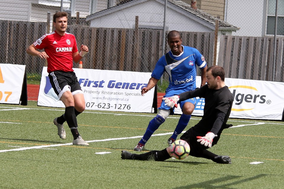 Chill forward Sullivan Silva slips his third goal of the afternoon past Winnipeg Lions goalie Sean Golden on Sunday, May 28, 2017 at Fort William Stadium (Leith Dunick, tbnewswatch.com). 