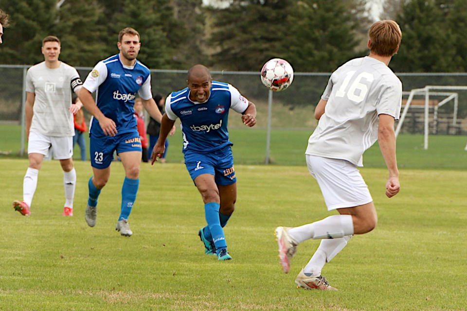 Thunder Bay's Sullivan Silva tries to head the ball past Winnipeg's Asher Wood, on Sunday, May 21, 2023. (Leith Dunick, tbnewswatch.com)