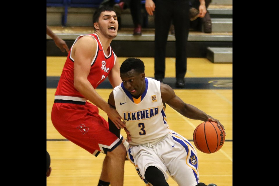 The Thunderwolves Nick Burke (right) crashes into Brock's Daniel Cayer on Friday, Jan. 13, 2017 at the Thunderdome (Leith Dunick, tbnewswatch.com). 