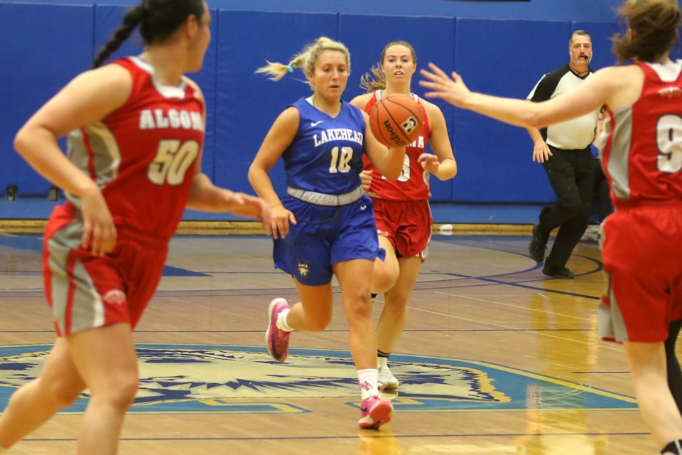 Karissa Kajorinne moves the ball up the court on on Thursday, Sept. 20, 2018 against Algoma. 