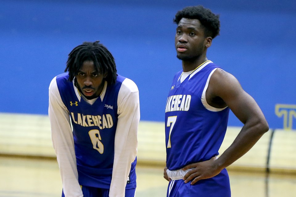 Lakehead Thunderwolves players Michael Okafor (left) and Laoui Msambya. (Leith Dunick, TBnewswatch)