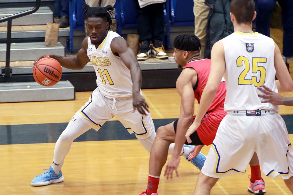 Lakehead's Nathan Bilamu (11) moves the ball against the Brock Badgers on Friday, Jan. 26, 2024. (Leith Dunick, tbnewswatch.com)