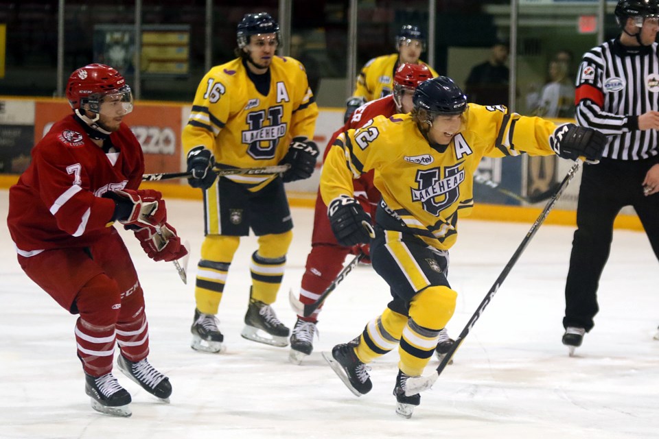 Brennen Dubchak (right) attempts to put space between himself and York Lions forward Stefano Pezzetta on Friday, Jan. 26, 2018 at Fort William Gardens. (Leith Dunick, tbnewswatch.com)