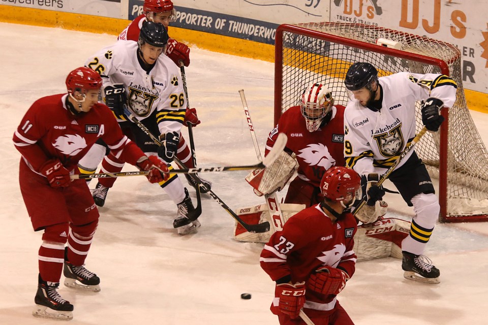 Scott Gall (26) and Tomas Soustal (19) battle in front of York goalie Mack Shields on Friday, Nov. 9, 2018 against the York Lions at Fort William Gardens. (Leith Dunick, tbnewswatch.com)