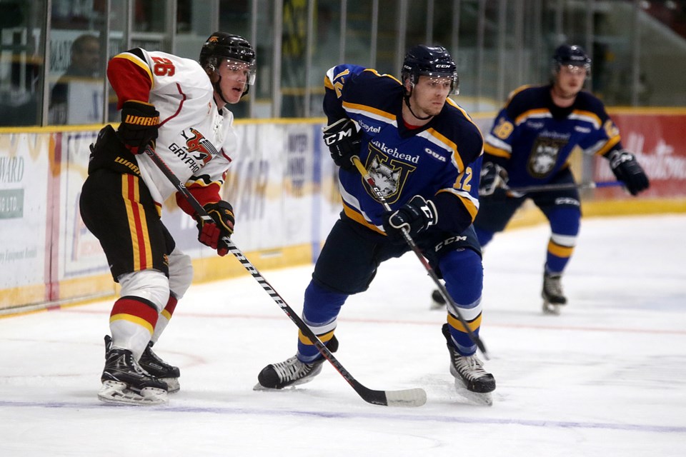 Guelph's Ted Nichol (left) and Lakehead rookie Geoff Dempster off the draw on Saturday, Sept. 28, 2019. (Leith Dunick, tbnewswatch.com)